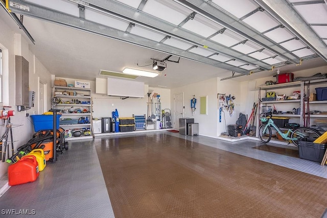 garage featuring a garage door opener