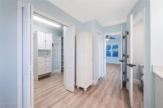 hallway featuring light wood-type flooring