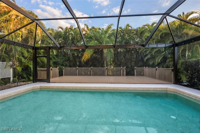 view of pool featuring a lanai