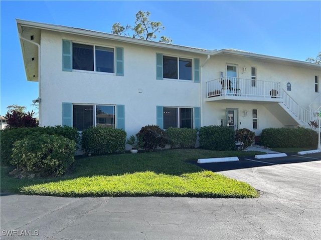 view of front of home with a front yard