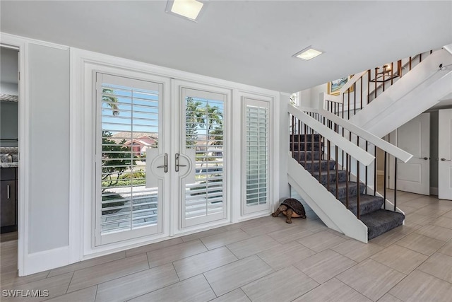 272 N Barfield Dr, Marco Island, FL 34145 - foyer entrance featuring stairs and french doors