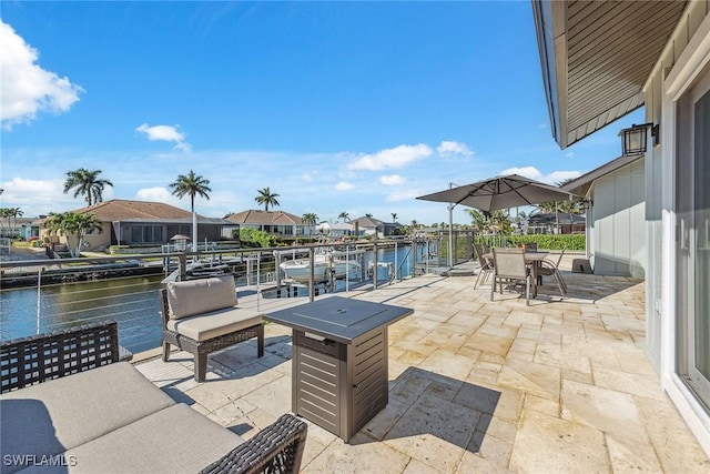 272 N Barfield Dr, Marco Island, FL 34145 - view of patio featuring a water view and a residential view