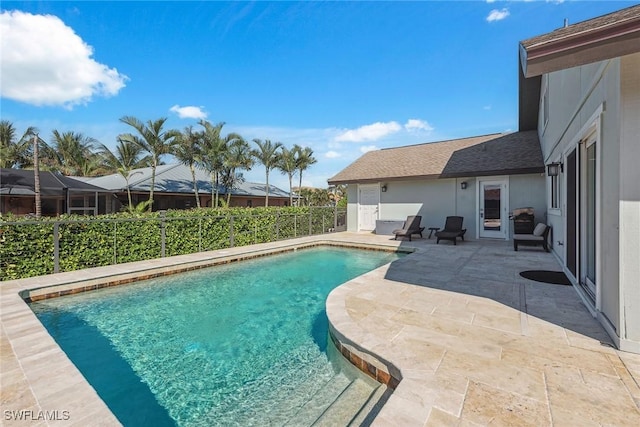 view of swimming pool featuring a patio