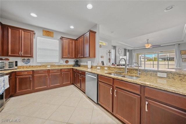 kitchen featuring light stone counters, stainless steel dishwasher, ceiling fan, sink, and light tile patterned floors