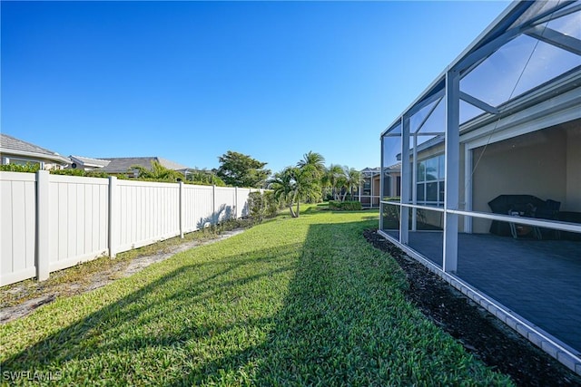 view of yard featuring a lanai and a patio