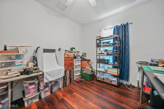 home office with hardwood / wood-style flooring and ceiling fan