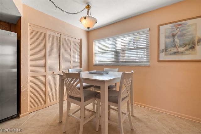 view of tiled dining space