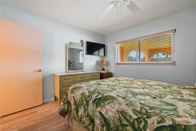 bedroom featuring ceiling fan and light wood-type flooring