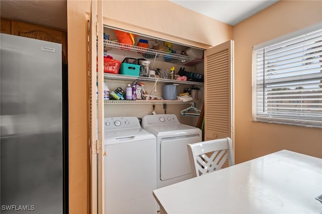 laundry area featuring washing machine and dryer