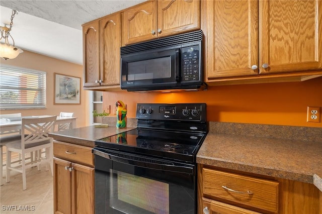 kitchen with black appliances and light tile patterned floors