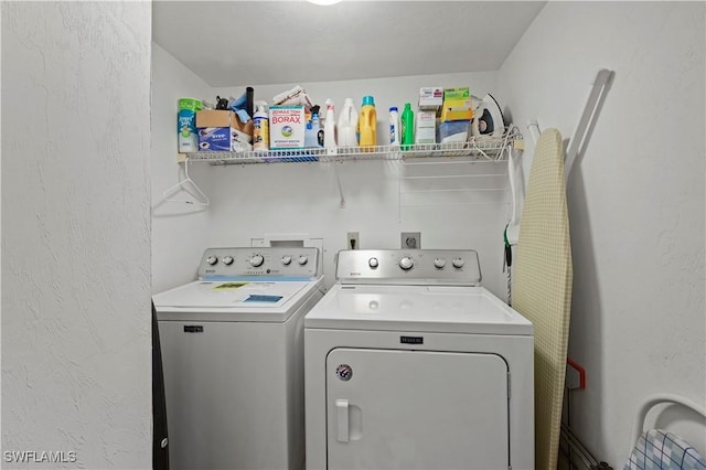 laundry area featuring independent washer and dryer