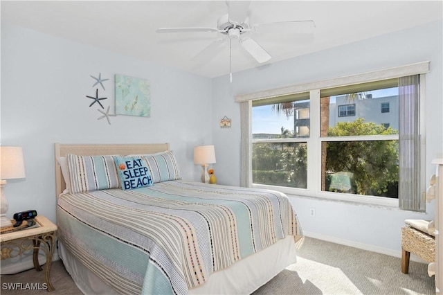 bedroom featuring ceiling fan and carpet floors