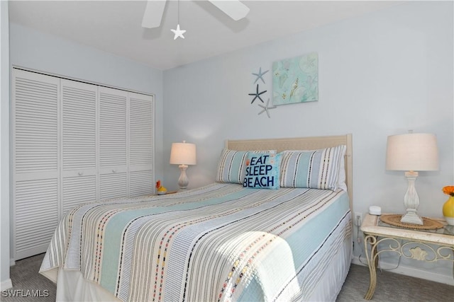 carpeted bedroom with ceiling fan and a closet