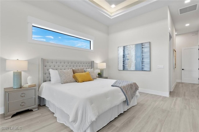 bedroom with light wood-type flooring