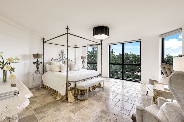 bedroom with ornamental molding