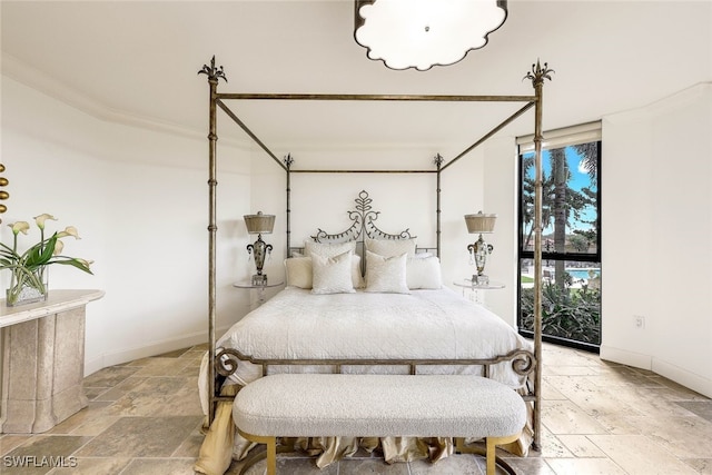 bedroom featuring crown molding