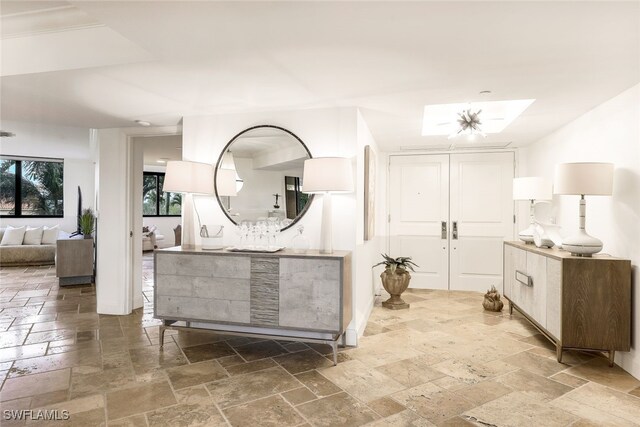 bathroom featuring plenty of natural light and vanity