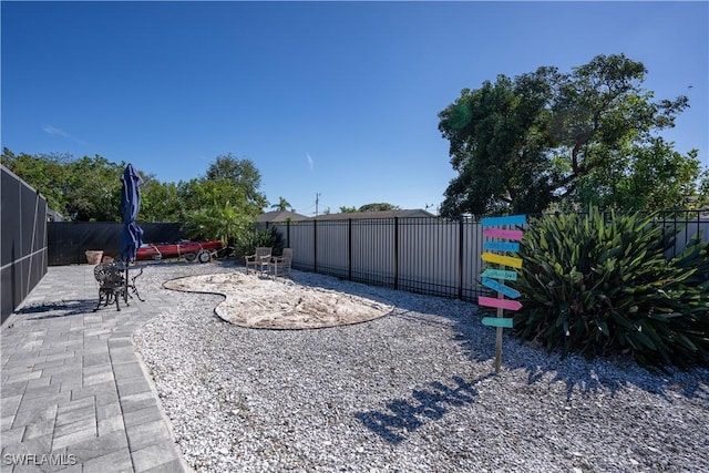 view of yard featuring a patio