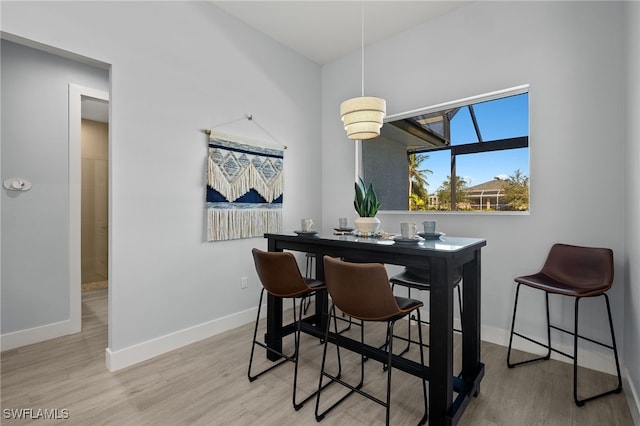 dining space featuring light hardwood / wood-style flooring