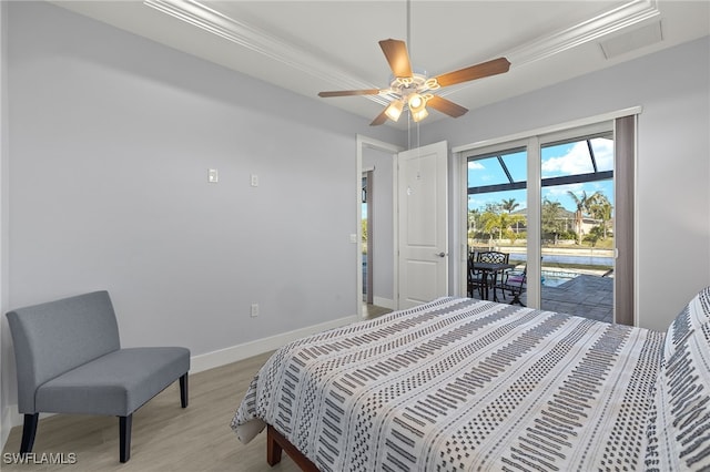 bedroom featuring ceiling fan, access to exterior, ornamental molding, and light hardwood / wood-style flooring