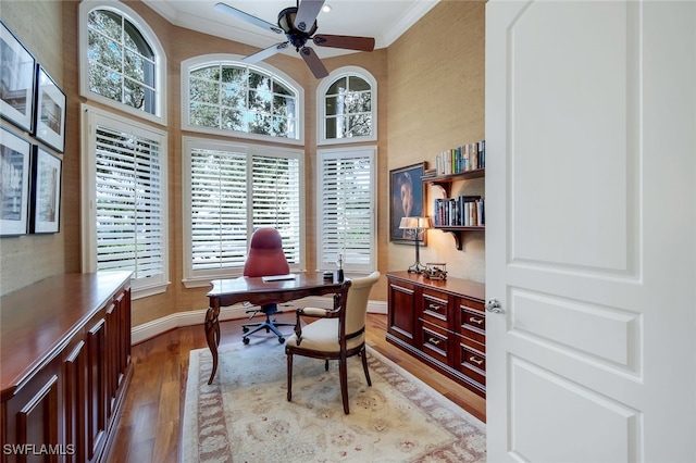 office space with ceiling fan, light hardwood / wood-style floors, and ornamental molding