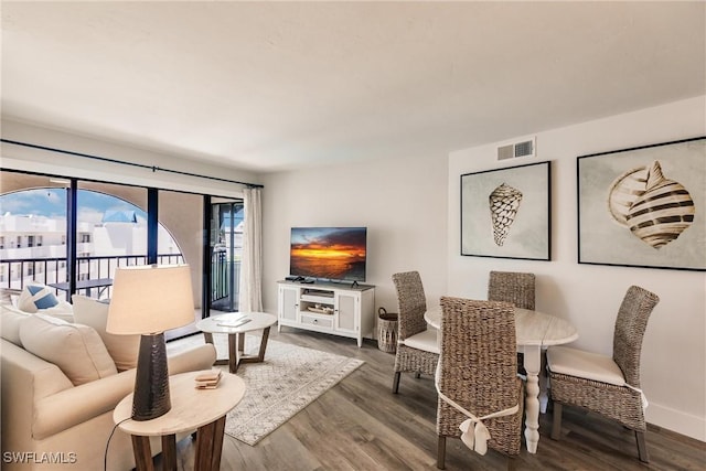 living room featuring dark hardwood / wood-style flooring