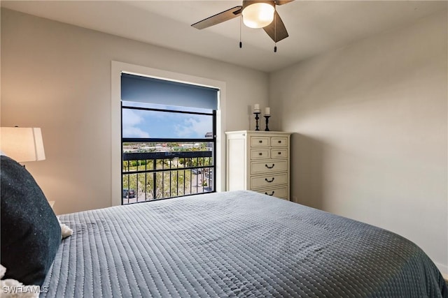 bedroom with access to exterior and ceiling fan