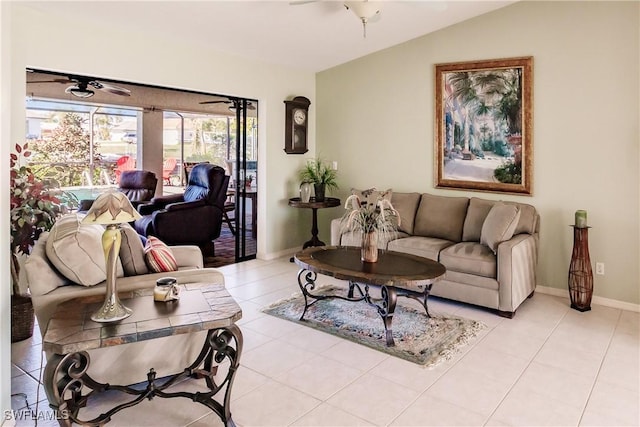 living room with light tile patterned floors, ceiling fan, and lofted ceiling