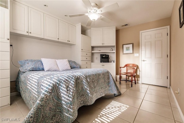 bedroom featuring ceiling fan and light tile patterned floors