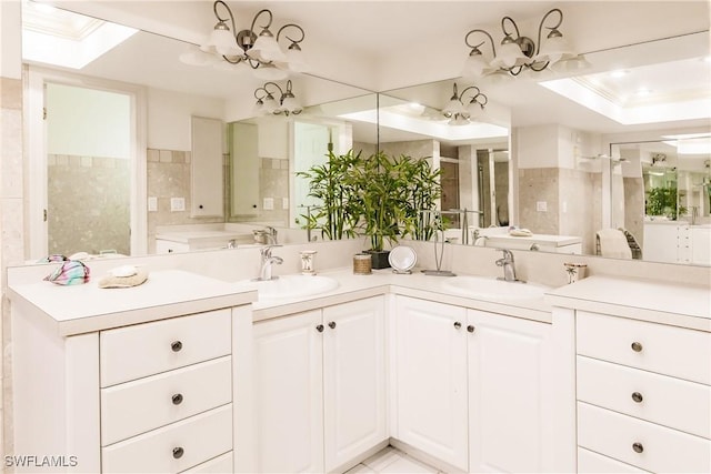 bathroom featuring vanity, ornamental molding, and tile walls