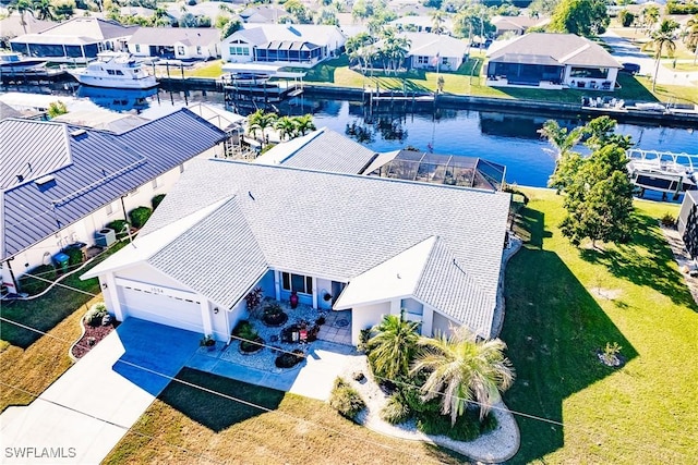 drone / aerial view featuring a water view