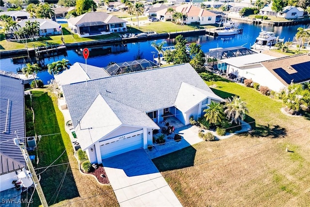 bird's eye view with a water view