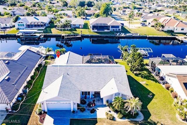 drone / aerial view with a water view