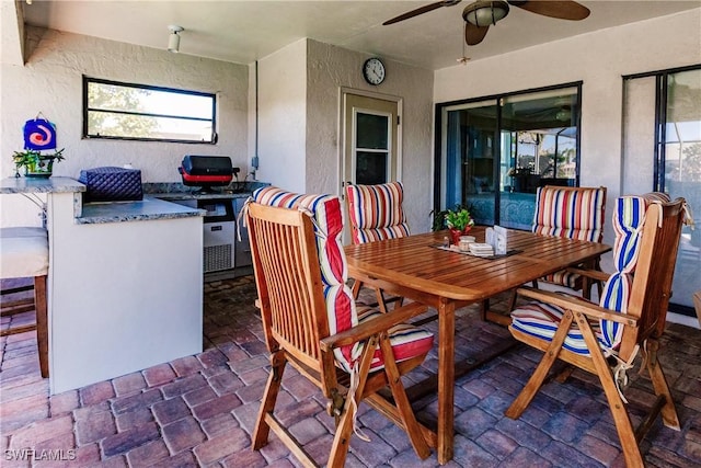 view of patio / terrace with ceiling fan