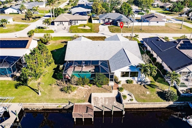 bird's eye view with a water view