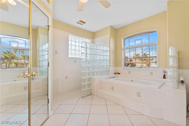 bathroom featuring tile patterned floors, ceiling fan, plenty of natural light, and independent shower and bath