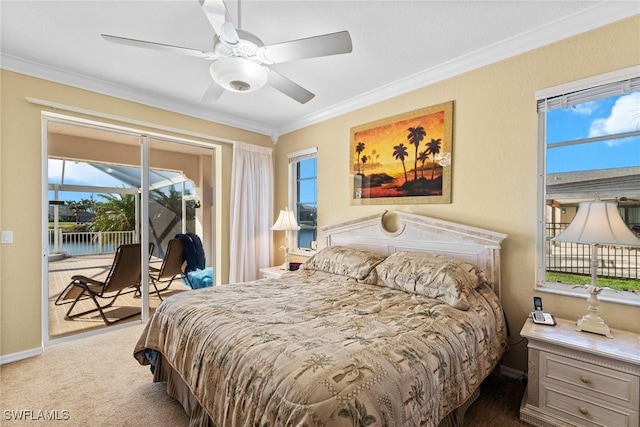 bedroom featuring access to outside, crown molding, carpet floors, and ceiling fan