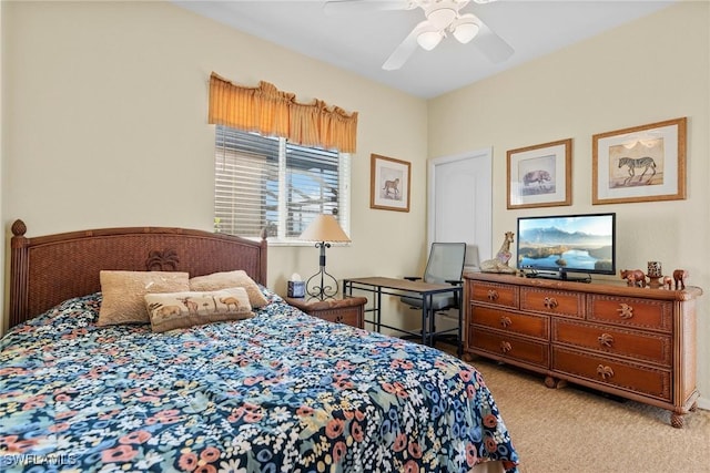 carpeted bedroom with ceiling fan