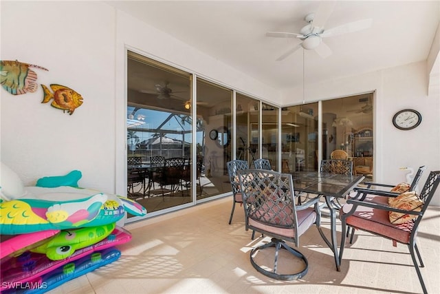 sunroom / solarium with ceiling fan