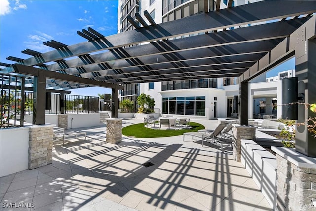 view of patio with a pergola and an outdoor hangout area