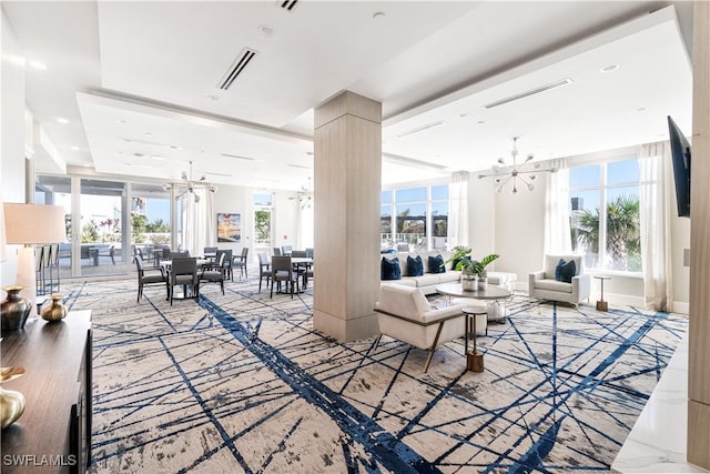 living room featuring a chandelier