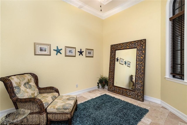 sitting room featuring ornamental molding