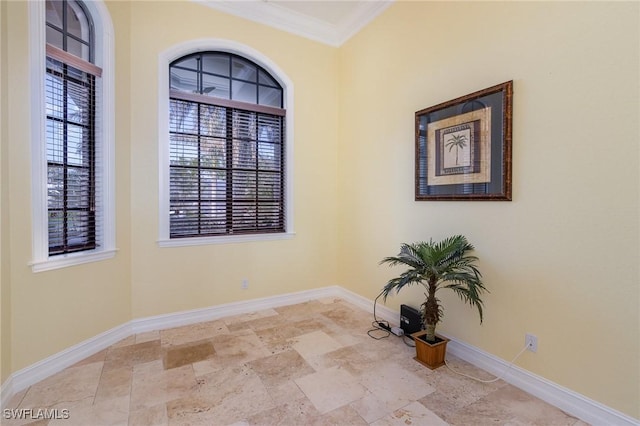 unfurnished room with ornamental molding