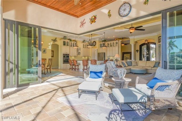 view of patio / terrace with ceiling fan and outdoor lounge area