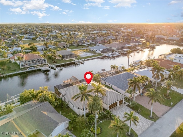 drone / aerial view featuring a water view