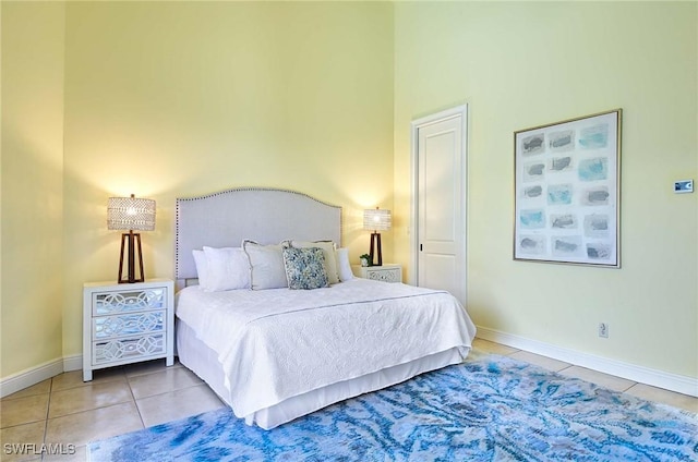 bedroom featuring tile patterned floors