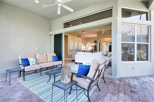 view of patio / terrace featuring outdoor lounge area and ceiling fan