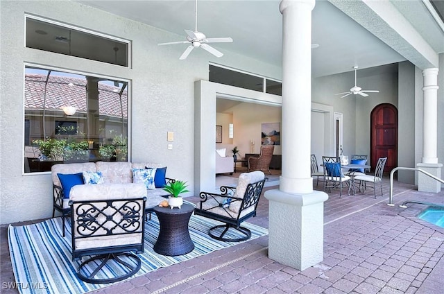 view of patio with ceiling fan