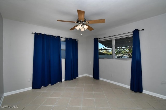 empty room featuring ceiling fan