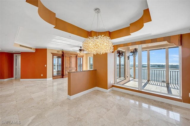 unfurnished dining area featuring a water view, crown molding, a raised ceiling, and ceiling fan with notable chandelier